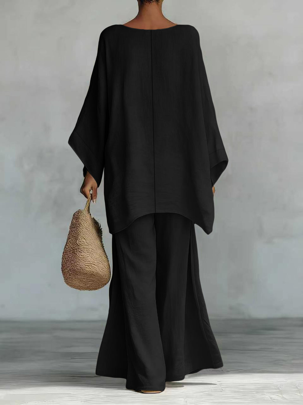 Zweiteiliges Damen-Set mit weiter Bluse und Hose