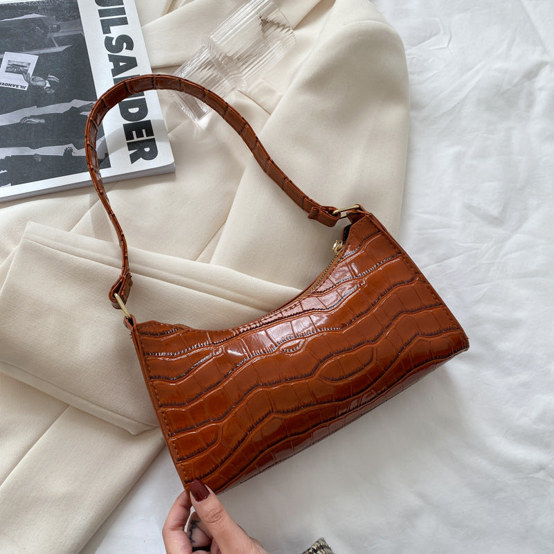 Schultertasche mit Prägemuster in Bonbonfarben