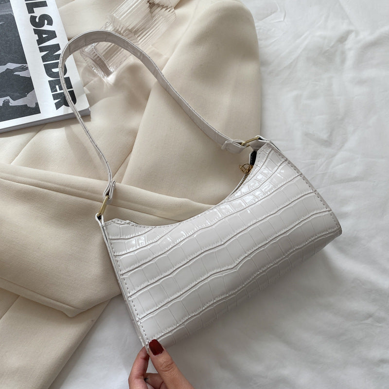 Schultertasche mit Prägemuster in Bonbonfarben