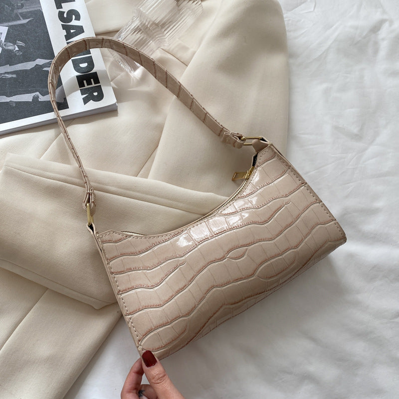 Schultertasche mit Prägemuster in Bonbonfarben