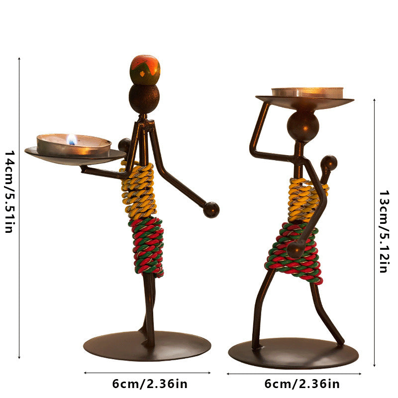 Kerzenhalter aus Eisen in Figurenform