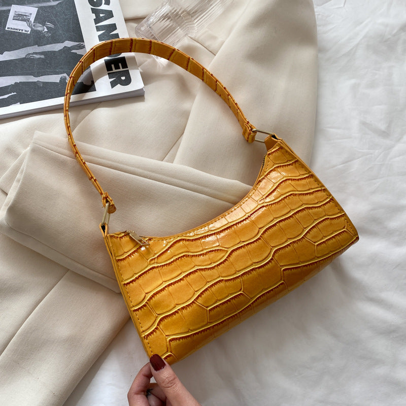 Schultertasche mit Prägemuster in Bonbonfarben